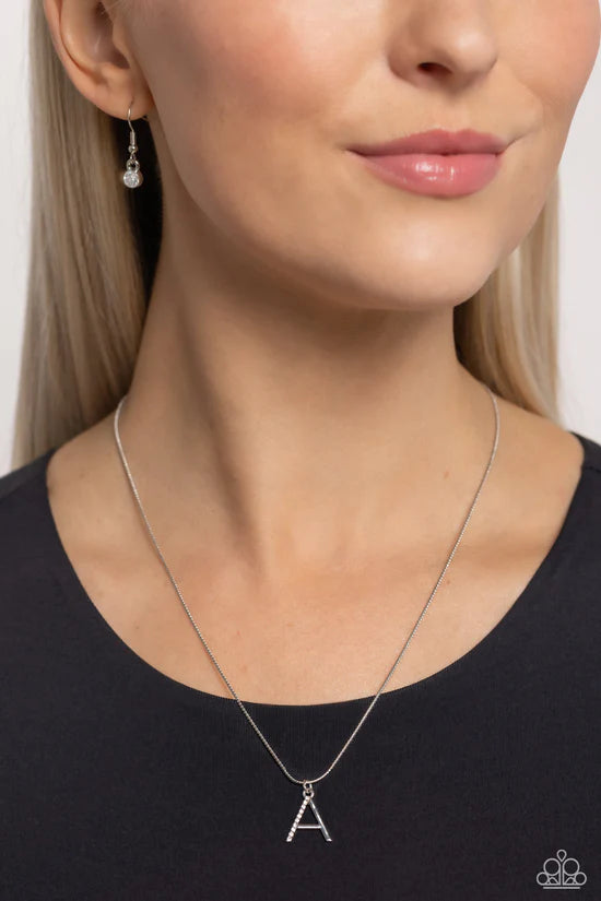 A - Letter of the Law Paparazzi Accessories Necklaces with Earrings Silver